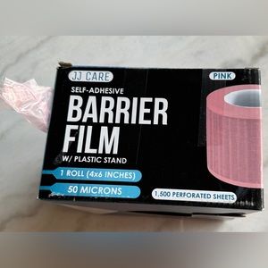Barrier film for tattoo or medical devices